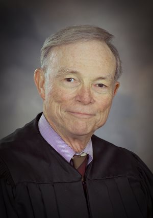 District Judge Gerald Elliott