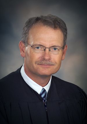 District Judge R. Scott McQuin