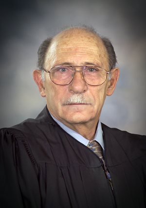 District Magistrate Judge Pat Carroll
