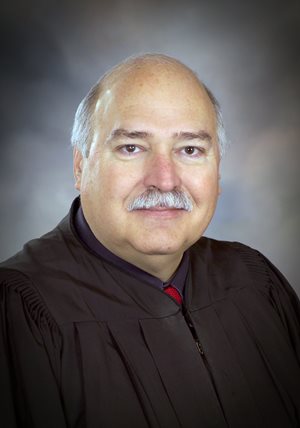 District Judge Douglas R. Roth
